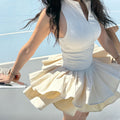Women's sleeveless zip tennis top and double-layer pleated skirt