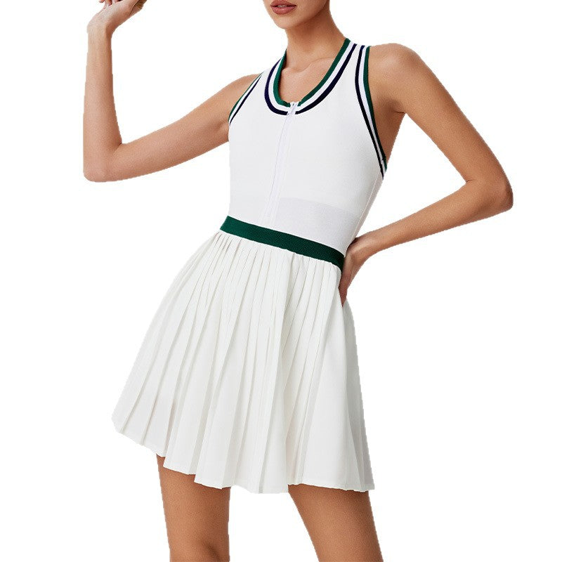 Woman wearing a white contrast-trim zip tennis dress in green