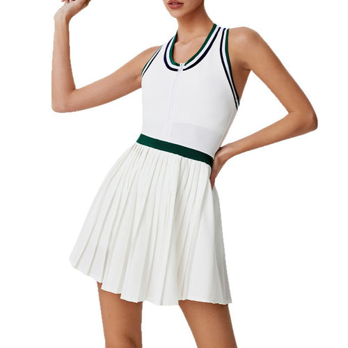 Woman wearing a white contrast-trim zip tennis dress in green